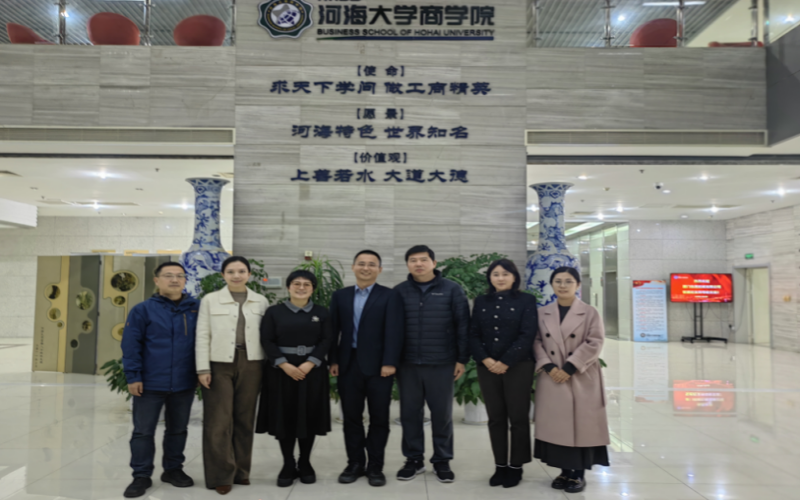 Devin Guo with representatives from School of Business at Hohai University