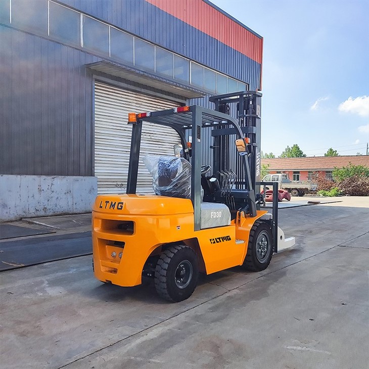 Forklift With Block Clamp Attachment